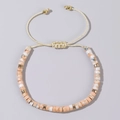 Adjustable hand-woven bracelet with orange marble beads and gold spacers on card - Orange Pink Marble Beads-Gold Cord-Single Bracelet