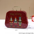 Red Christmas nutcracker tin storage box with golden handle and festive illustration - Nutcracker