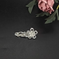 Silver alloy hair clip with cat eye stone flower and pearls on a sleek black backdrop - Five-Petal Flower / Silver
