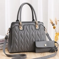 Grey V-quilted handbag set with matching wallet and golden hardware on a white background - Gray