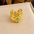 Bohemian gold-tone open ring featuring a sunburst motif with turquoise stones - Adjustable Open