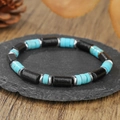 Dettaglio di bracciale in pietre naturali con cilindri neri e pietre dell'imperatore blu - ZJ14880-Bracciale distanziatore in argento turchese blu cilindro nero