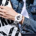 White multi-function dual display sports watch worn on wrist with street style aesthetic - White