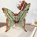 Translucent green butterfly hair claw clip with golden spring on a jewelry tray - Green Dragon Butterfly 10.5CM