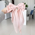 Pink satin bow hair clip with long ribbons featuring a glossy finish for women - Champagne