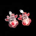 Close-up of reindeer shaped glowing Christmas earrings with red LED light on black background - Transparent Reindeer Ear Clip
