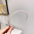 Cerchietto con perle bianche