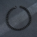 Detailed view of a black stainless steel Cuban link bracelet on a textured surface. - Two-Side Grinding Curb / Black