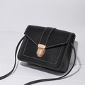 Minimalist black PU leather crossbody bag with white stitching and gold buckle closure - Black