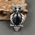 Retro silver owl brooch pendant with dark blue sandstone inlay and sparkling eyes - Synthetic Blue Goldstone