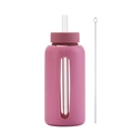 Detail of pink glass water bottle with silicone sleeve, straw, and cleaning brush - Smoky Pink