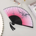 Pink gradient silk folding fan with plum blossom pattern and black tassel detail - No.69 Pink Gradient Ink Plum
