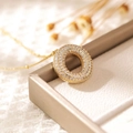 Gold plated puffy doughnut pendant necklace featuring micro-paved sparkling zircon stones - Letter O (18k Gold + Bead Chain)