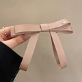 Elegant lotus pink grosgrain ribbon bow hair tie with a small metal tag accent - Hair Bow / Champagne