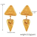 Golden titanium steel earrings featuring geometric evil eye and heart pendants - F1517 / Gold