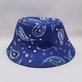 Detailed close-up of dark blue paisley bucket hat with white intricate floral patterns - Navy Paisley