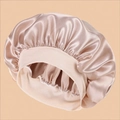 Silky satin bonnet for hair protection in elegant champagne gold with wide elastic band - One Size / Off-white