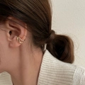 Detail shot of the gold minimalist double arc ear cuff showing its sleek metallic finish - Gold Double-Layer Ear Bone Clip