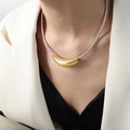 Baroque geometric necklace with silver snake chain and curved gold pendant worn by model - 40CM / Steel Gold Necklace (P1604)