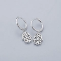 Close-up of S925 sterling silver Hamsa hand dangle earrings with hollow design - Palm Hamsa Earrings-Platinum Silver