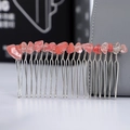 Detail view of handmade pink crystal chips hand-wired onto a silver metal hair comb base - Watermelon Quartz + 20-Tooth Silver Comb