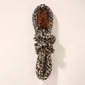 Detailed view of leopard print heatless hair curler set with amber hair claw clip - Rubber Stick Leopard (1 Curler + 2 Scrunchies + 1 Clip)