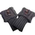 Detail of dark grey knit leg warmers showing diamond texture and brown buttons - One Size / Dark Gray