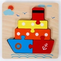 3D wooden ship puzzle for toddlers featuring colorful geometric shapes and cartoon ocean print - Ship with Buckle