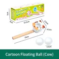 Classic cow-themed wooden floating blow ball toy for sensory training with retail box - Cow
