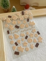 Macro shot of 3D Christmas gingerbread man nail stickers with embossed resin texture - Embossed YT3984 (Gingerbread Man, Tree, Stars & Chocolate)