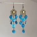 Detail of retro ethnic drop earrings with bronze floral motifs and blue sequins - 2# Earring Hook - Lake Blue (Vintage Tassel)