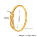 Detail shot of golden stainless steel knot bracelet with micro-paved zircon stones - Gold Rope Knot Zirconia Style (Z509)