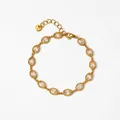 Elegant gold plated oval zircon bracelet with lobster clasp and beaded edge detail - Gold Bracelet (B706)