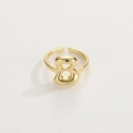 Detail of 18K gold letter B open ring featuring a 3D puffy aesthetic and polished finish - Gold Ring B
