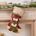 Christmas stocking with 3D snowman pattern in red and beige on festive fireplace mantel - Standing Snowman Stocking