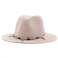 Close-up of pink straw hat with turquoise beads and vintage feather metal pendants - Nude Pink