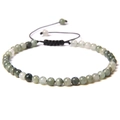 Macro detail of 4mm natural stone beaded bracelet with adjustable black braided cord - Green Straw Hat Stone