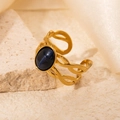 Detail of vintage gold-plated steel ring with oval blue cat eye gemstone and rope band - Braided Deep Blue Stone Adjustable Style (TYR0715)