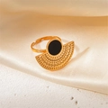 Titanium steel ring featuring a golden fan-shaped hollow design and black circular inlay - Hollow Black Shell Ring