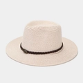 Close-up of breathable beige straw sun hat with brown woven leather band and metal badge - One Size / Pink