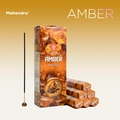 Mahendra Amber incense sticks shown with bulk packaging and small retail boxes - Amber
