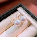 Macro shot of iridescent mermaid pearl earrings with golden base on jewelry box - 20# Silver Earring Post-Gold White-11mm (Aurora Luster)