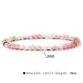 Detail view of 4mm natural stone bead bracelet with a circle length of 19cm - 4mm Mixed Watermelon Stone