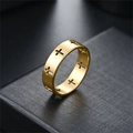 Detailed macro view of the gold-finished cutout cross pattern on a minimalist ring - Size 5 / Gold