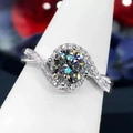 Silver moissanite ring with round center stone and sparkling twisted pavé band - Platinum Angel Eye Ljz-07 / Adjustable Open
