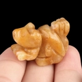 Miniature hand-carved orange squirrel crystal animal figurine with natural agate texture - Topaz