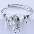 Silver stainless steel beaded bracelet with angel wings swan charms and Paris logo - Light Blue
