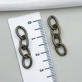 Cadena de extensión de llavero de bronce con juntas tóricas para accesorios de bricolaje - 27x7mm (1.0g) / Bronce Antiguo