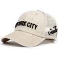 Macro detail of NEW YORK CITY foam printing and vintage embroidery on mesh trucker cap - Adjustable / Milky White