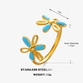 Bague ajustable en acier inoxydable doré ornée de deux fleurs en émail bleu élégantes - Bague Fleur Bleue